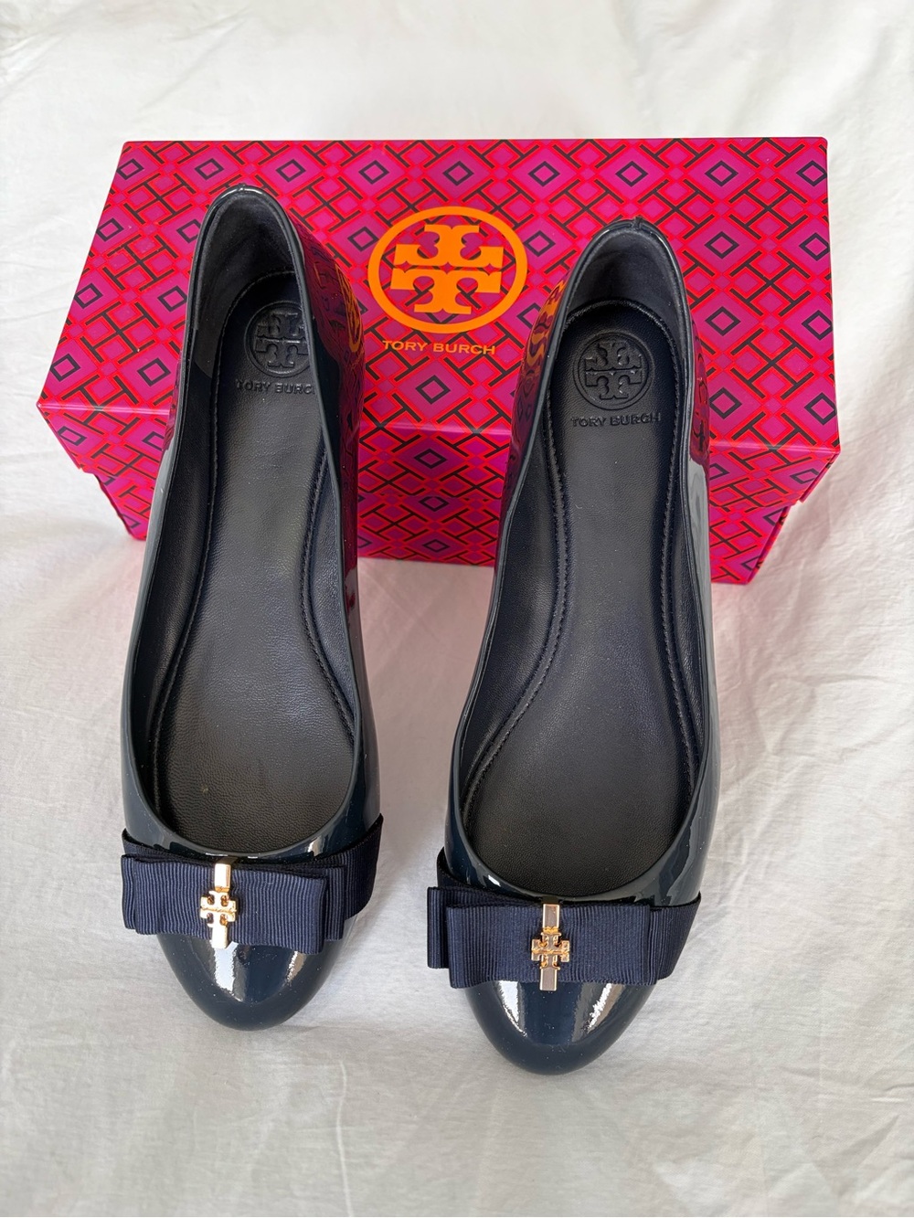 Tory Burch Navy Patent Bow Flats with Gold Logo